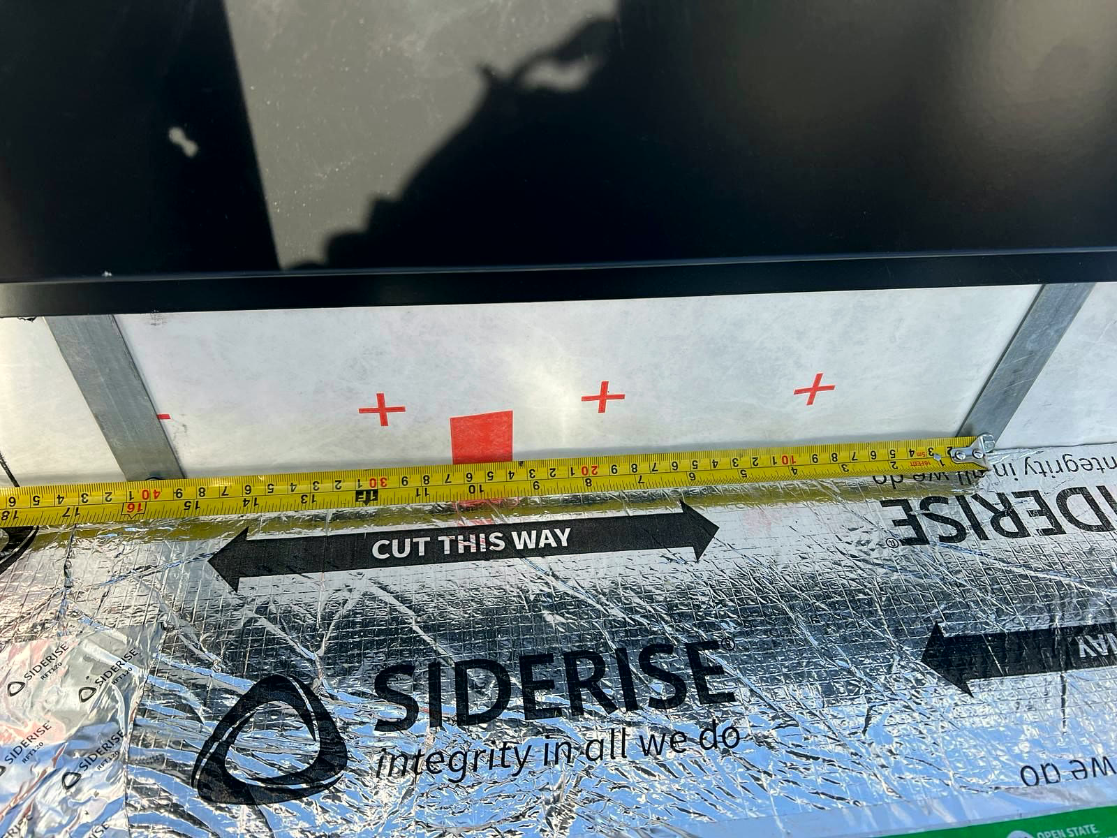 Cavity barrier measured with a tape before fixing